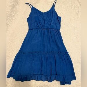 This is a medium, mid thigh length dress from alterd state.